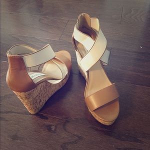 - Never worn Steve Madden Wedges!
